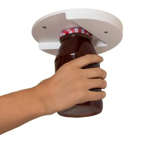 The Grip under-cabinet jar opener mounted securely with white finish