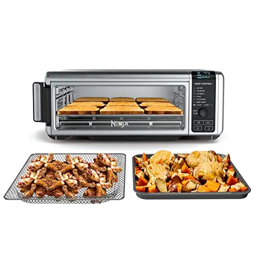 Ninja Digital Air Fry Countertop Oven toasting chicken wings